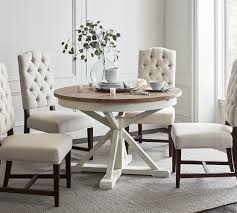 Lakewood white spindle back side chair. Hart Round Reclaimed Wood Pedestal Extending Dining Table Pottery Barn