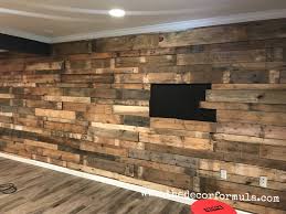 A handmade pallet bed frame is just about as easy to make look bad as it is to make it look good. Diy Pallet Walls The Who What Where How Of Our Beautiful Pallet Wall The Decor Formula