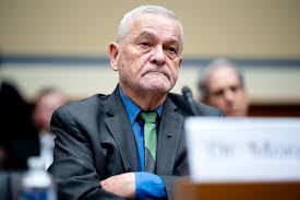 Former Health Official Charged With Concealing Emails About Covid-19 Grants