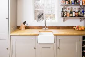 If you fancy the warmth of wood in your kitchen, why not clad the ceiling too for a cosy, cabin effect? Hardwood Worktops Bespoke Kitchens Charlie Kingham