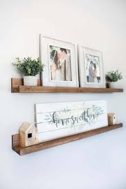 #2) large family photo gallery wall decor idea. 45 Best Rustic Living Room Wall Decor Ideas And Designs For 2021