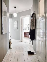 9 Statement Hallway Ideas That Will Bring The Thoroughfare To Life Hallway Flooring Hallway Decorating White Floors