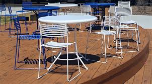 Metal dining chairs with wooden seats and bleachers bar. Steel Terrace Cafe Chairs And Bar Height Chairs Belson Outdoors