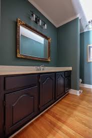 You don't have to necessarily paint or go bold to introduce navy into your home. Hale Navy Bathroom Cabinets Fingers Crossed