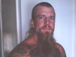 Police hunt bushland for 'armed and dangerous' man