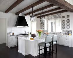glass lantern pendants over island