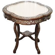 Elegant and simple design creates a sleek silhouette. 1924 British Empire Chinese Exhibition Rosewood And Mother Of Pearl Inlaid Table At 1stdibs