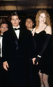 The front of the dress was subtly detailed with floral embroidery and she matched her silver shoes with the metallic finish of the dress. How Nicole Kidman Dressed In The 90s Stylebistro