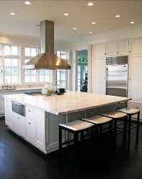 Large kitchen islands can seat as many as six people, but even small kitchen islands typically have space for two seats. Interior Design Ideas Kitchen Island With Stove Kitchen Island With Cooktop Interior Design Kitchen