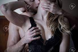 Man Caresses Neck And Breast Of Woman In Bed Stock Photo, Picture and  Royalty Free Image. Image 41101558.