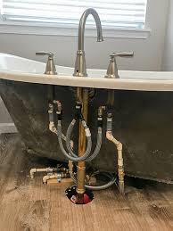 In addition to removing and installing your new bathtub, they will also connect the plumbing associated with the a small to medium sized freestanding tub is similarly simple to install, as it can be placed freely in a space. Installing A Freestanding Bathtub One Room Challenge Week 5 Petals Pies And Otherwise