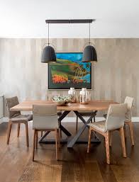 What kind of wood is a round dining room table made of? 15 Thrilling Tropical Dining Room Interiors That Will Impress You