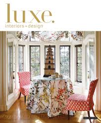 .moore cool breeze topped with white marble fitted with his and hers sink and oil rubbed bronze faucets under oval beveled mirror illuminated by oil rubbed bronze and glass sconces, pottery barn mercer sconces, lining a sky blue brick tiled backsplash, ann sacks capriccio field tile sky blue. Luxe Magazine January 2016 National By Sandow Issuu