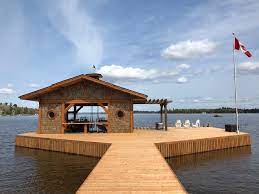 113 best boat dock images docked out diy dock accessories add ons at kroeger decor tips for your dock oasis acm christmas decorating ideas home tour a freaking dock hammock with images. Lake Of The Woods Boat House Rustic Deck Other By Kenora Design Group Houzz