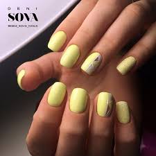Tribal nail art design in bright yellow. Matte Yellow Nails Design Matte