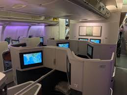 The seat area is spacious and offers a good amount of legroom while not confining a passenger's legs too. First Impressions Cathay Pacific A330 Business Class Live And Let S Fly