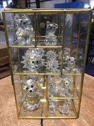We offer a crystal glass dome display cases with wood base these glass dome display cases are made of highest quality glass. Swarovski Crystal Figurines 13 Asstd In Glass Display Case
