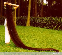 This beautiful hairstyle is achieved by twisting and pinning curly hair. Hope For Nigeria Bizarre Woman With The Longest Hair Photos Hope For Nigeria