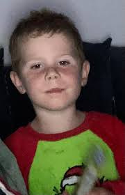 A child is suspected of carrying out the firebomb attack that claimed the  lives of four-year-old Tadhg Farrell and his grandaunt, Mary Holt. The  attack, in Edenderry, Co Offaly, is thought to