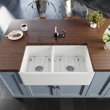 If the stain is still present then leave it on for a little while longer. Rene Fireclay 33 X 18 Double Basin Apron Kitchen Sink With Grid And Basket Strainer Reviews Wayfair