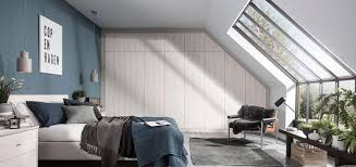 Sloping ceilings in our homes are often viewed as an obstacle when we are designing our spaces, but what happens when you stop fighting against them, and work with these architectural visualizers have impressed us on many levels, even way up in the eaves, creating loft living like no other. Fitted Sloping Ceiling Wardrobes Awkward Spaces Sharps