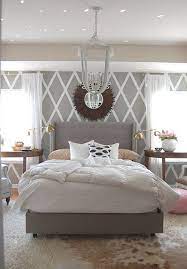 A pair of purple accent pillows mimic the color of the wildflowers and add a beautiful pop of color. 45 Beautiful Paint Color Ideas For Master Bedroom Hative
