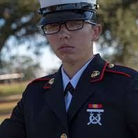 Chief Logistics Specialist Suzette Loy, left, pins anchors onto Chief  Logistics Specialist Josianne Thompson during a chief petty officer pinning  ceremony at Naval Support Activity Bahrain.