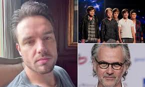 Under 18s should be stopped from joining pop bands to protect their mental  health after Liam Payne's death, says Robbie Williams' friend and  songwriter