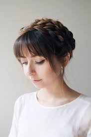 Low bun with thick braids. Cute Diy Milkmaid Braids For Thick Hair Styleoholic