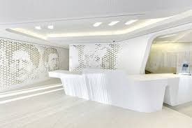 Another Angle Of The Reception Desk And Its Clean Curves Modern Bank Interior Design Raiffeisen In Zurich Office Interior Design Modern