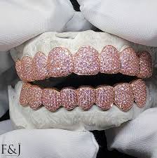 Contact us for pricing on 18k and 22k and with diamond dust and diamond cuts. Fully Iced Out 14k Rose Gold Grillz Made Custom For Imjstash Or Email Gold Grillz Grillz Diamond Grillz