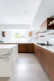 Apr 10, 2019 · if your kitchen is in need of an aesthetic revival, applying a few coats of color to dull or dated cabinets can make your space feel fresh and modern, without the commitment of a gut renovation. 75 Beautiful Kitchen With Brown Cabinets Pictures Ideas July 2021 Houzz