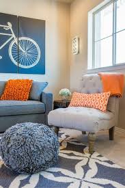 Be Sure The Tones Of Blue Are Less Vibrant This Complimentary Themed Room Really Works Living Room Orange Living Room Decor Home Decor