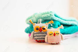 Check spelling or type a new query. Two Small Multi Colored Knitted Handmade Owl Toys Sits Against A White Background Amigurumi Blurred Color Background There Is A Place For Text Stock Photo Picture And Royalty Free Image Image 145609701