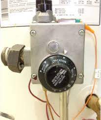 Remove the access cover off the water heater on the bottom of the water heater. A Few Suggestions Before You Go On Vacation Water Heater Programmable Thermostat Gazifere
