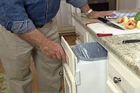 It is a small box that you plug into the wall behind your cabinet so it can operate electrically. Diy Pull Out Trash Bin For Your Kitchen Learn How To Make It Ron Hazelton