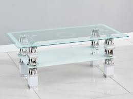 You can choose a simple table that's basically four legs and a tabletop, and that's just fine for many people. Glass White Coffee Table With Shelf For Living Room