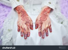 Even an innocent peck on the cheek is considered noteworthy. Closeup Hands Malay Wedding With Henna Selective Royalty Free Stock Photo 330910070 Avopix Com