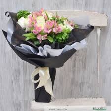 Flower co is your best option for toronto rose delivery. Black Or White Flower And Fruit Basket Online Flower Delivery Bloom2u