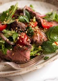 Top with steak and drizzle with dressing. Thai Beef Salad Recipetin Eats