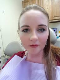 Great Pyrenees dog drinking water after brushing