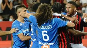 The french ligue 1 game between nice and marseille was abandoned sunday after fans of the home side invaded the pitch and angrily confronted opposing player dimitri payet, who had thrown a bottle. Ycfvnwkeythg6m