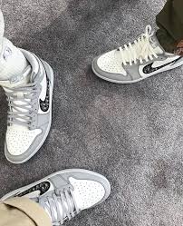 Michael jordan's legendary status transcends the game of basketball; Dior Air Jordan 1 Low Release Date Sneaker Bar Detroit Fashion Shoes Sneakers Sneakers Fashion Air Jordan 1 Dior