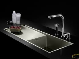 Spulbecken Aus Edelstahl Mit Abtropfflache Water Units Spulbecken Aus Edelstahl By Dornbracht Kuche Einbauen Kuche Spulbecken Kuchenspule Edelstahl