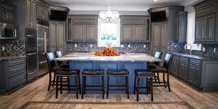 Stock base cabinets are generally 24 inches deep (not counting countertop overhang).deeper base cabinets make it difficult for you to reach the back of the counter or to plug in appliances. Countertop Overhang Styles And How To Choose Your Best Fit