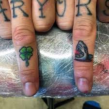 Small black ink four leaf shamrock tattoos on wrists. 60 Four Leaf Clover Tattoo Designs For Men Good Luck Ink Ideas