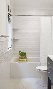 Tiling a floor in your room? White Bevel Subway Tile Bathroom Classic Bathroom Design Classic Bathroom White Bathroom Tiles