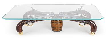 The top is treated for water or liquid repellent. Classy One Of A Kind Gun Coffee Table