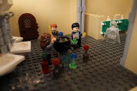 This is the polyjuice potion scene from harry potter and the chamber of secrets. Accio Lego Builder Alice Finch Shares The Secrets Of Hogwarts Lego Hogwarts Hogwarts Lego