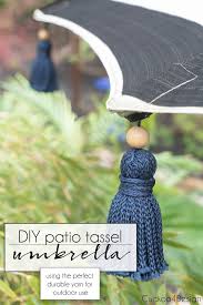 Black And White Striped Outdoor Umbrella Australia Diy Tassel Umbrella Using Durable Outdoor Yarn Cuckoo4design In 2020 Diy Tassel Umbrella Outdoor